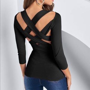 Beautiful Strappy Back Top! Daring wide strap details crisscross. 3/4 sleeves.